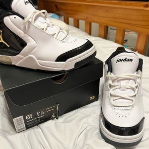 Jordan Nike Big Fun (GS) size 6.5Youth/8.5women black white and gold